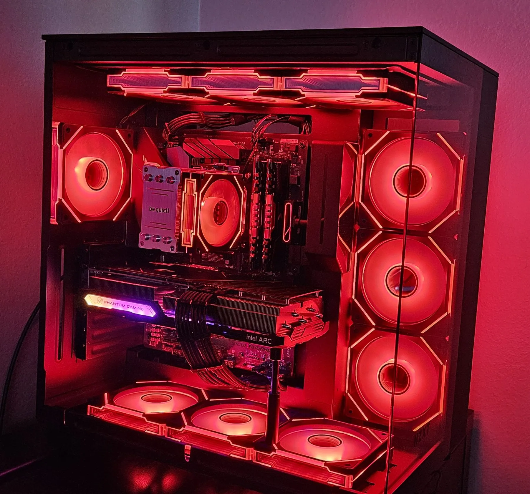 The H9 Flow build lit red, including an RGB fan on the CPU cooler and sleeved cables