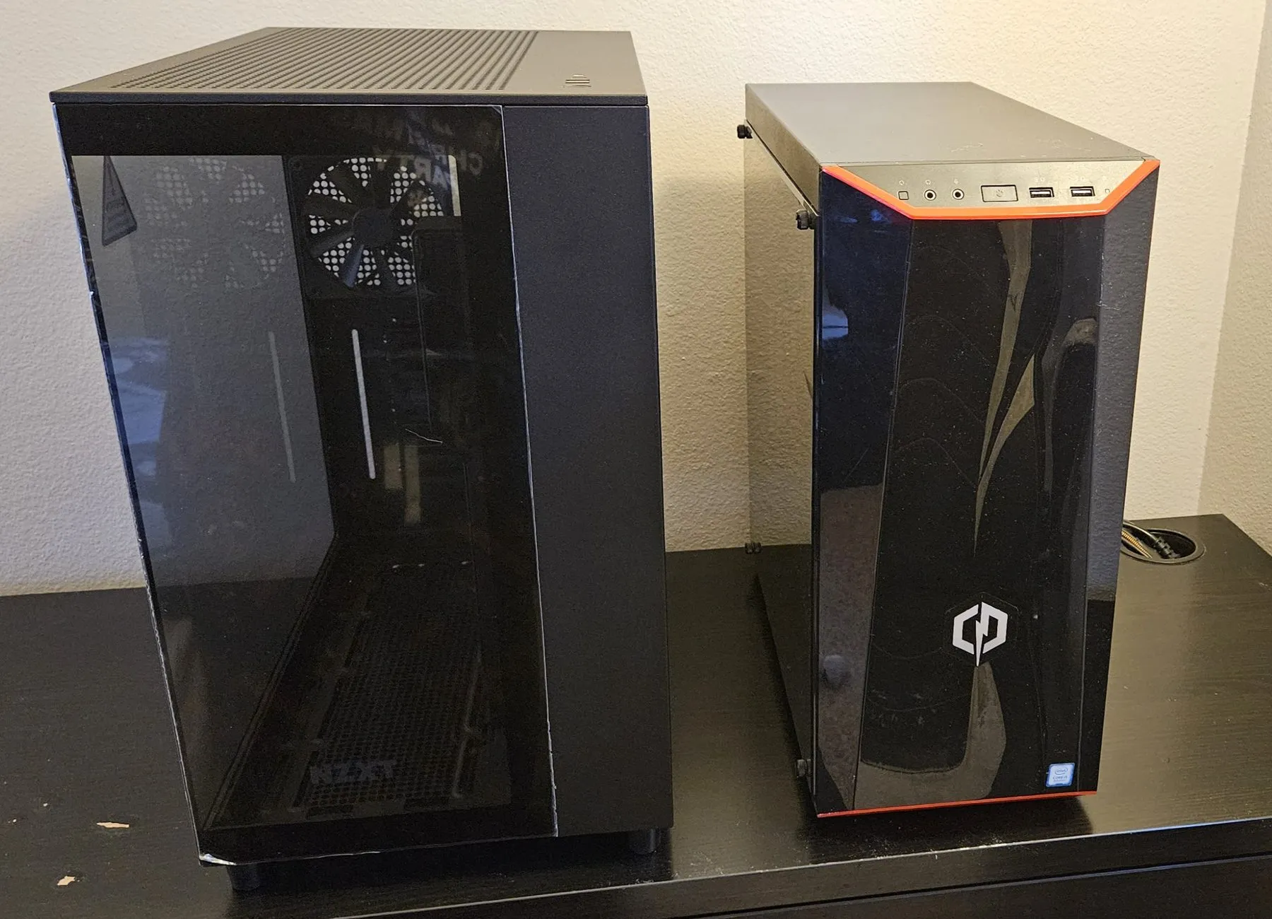 The new NZXT H9 Flow next to the old CyberPowerPC case