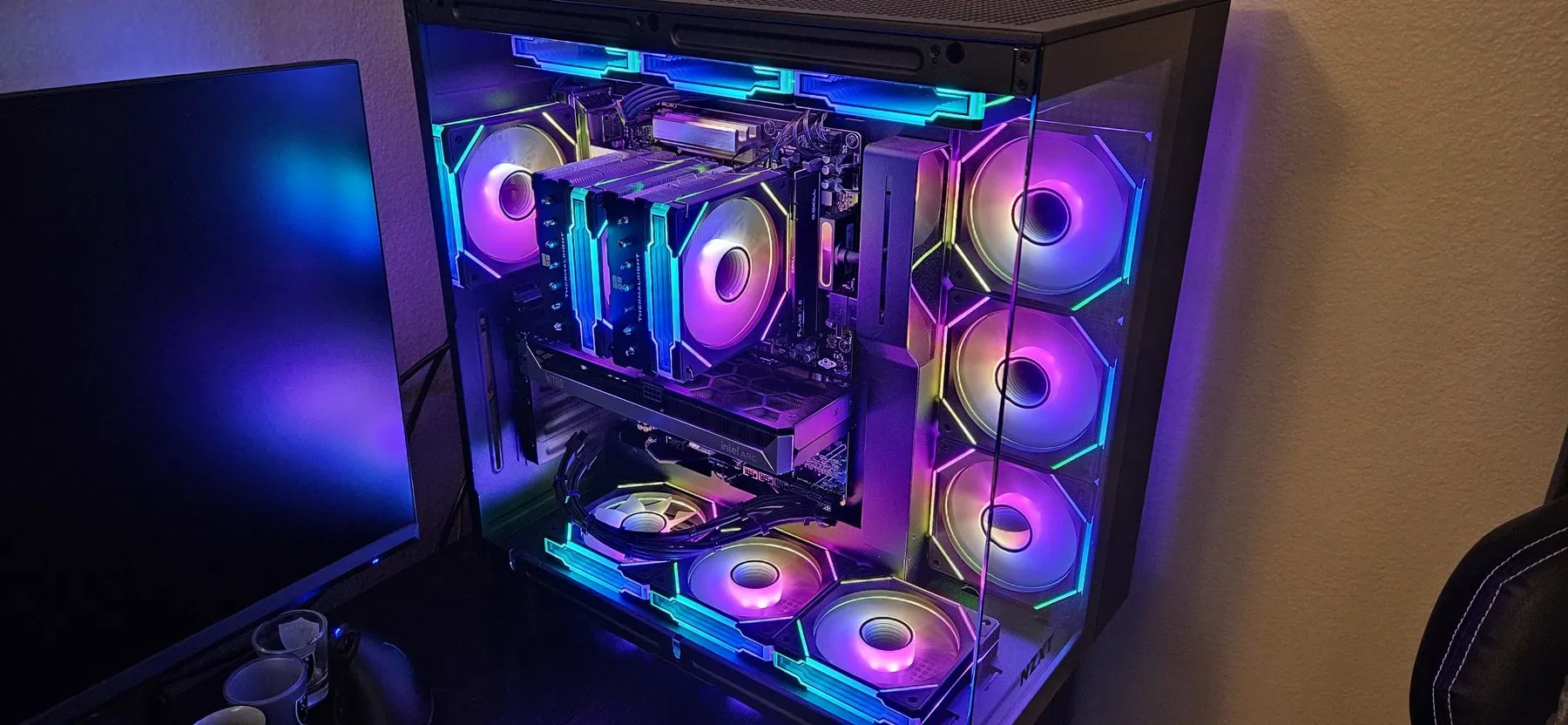The AM5 build with the Arc B580 installed, lit in rainbow ARGB